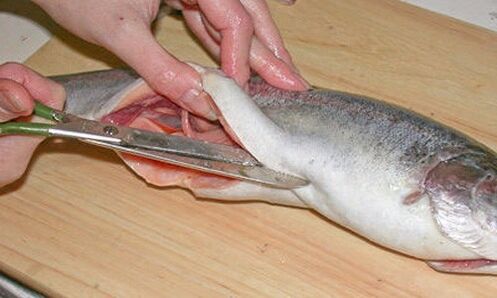 Carefully slicing fish on a personal cutting board protects against parasitic infestations